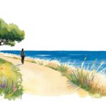 eine Frau, die am Meer spazieren geht