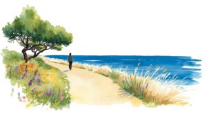 eine Frau, die am Meer spazieren geht